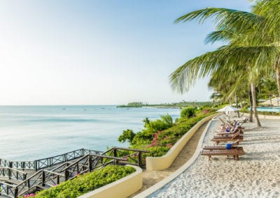 Flight Centre Zanzibar private beach with loungers