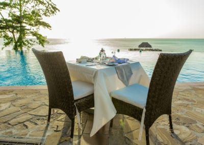 Flight Centre Zanzibar poolside dining table at hotel