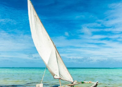 Flight Centre Zanzibar boat on the shore